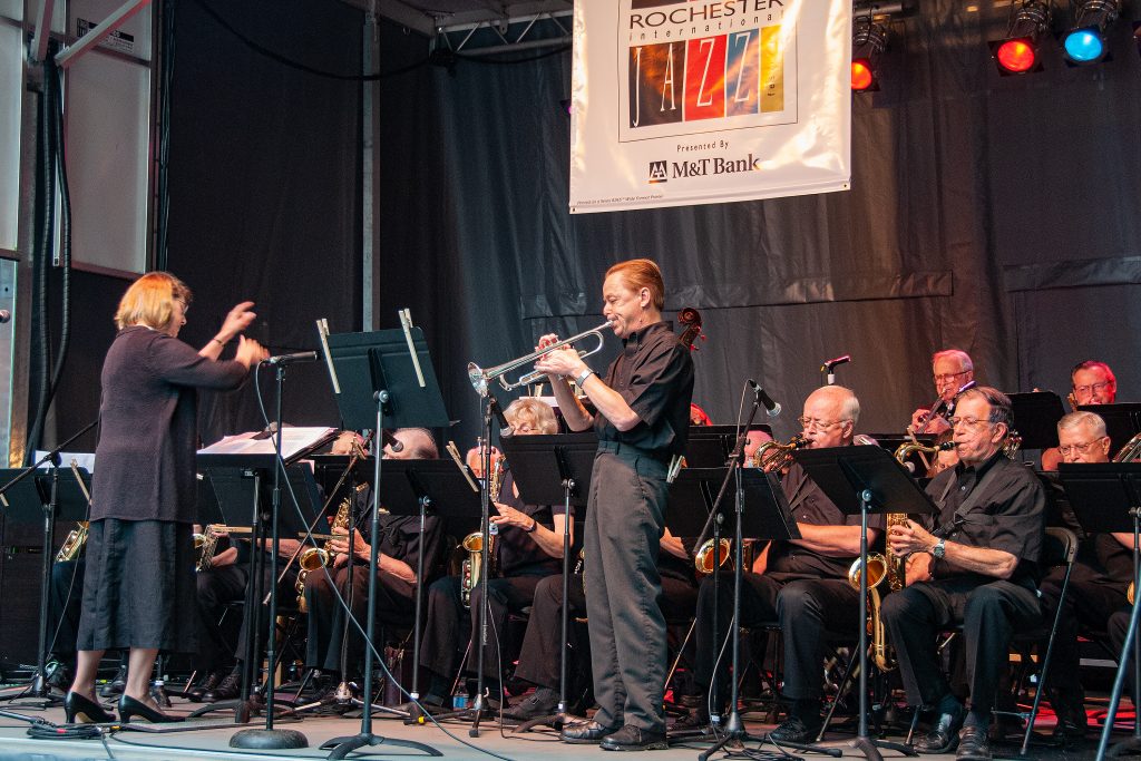 Marcia conducts Bill Pierce and the New Horizons Big Band at the Rochester International Jazz Festival, 2009.